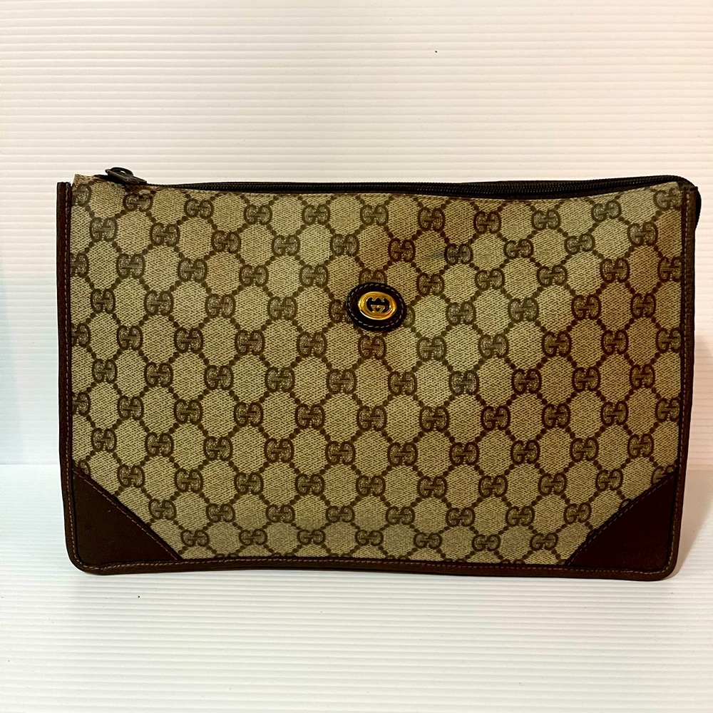 Authentic Gucci monogram leather Brown pouch